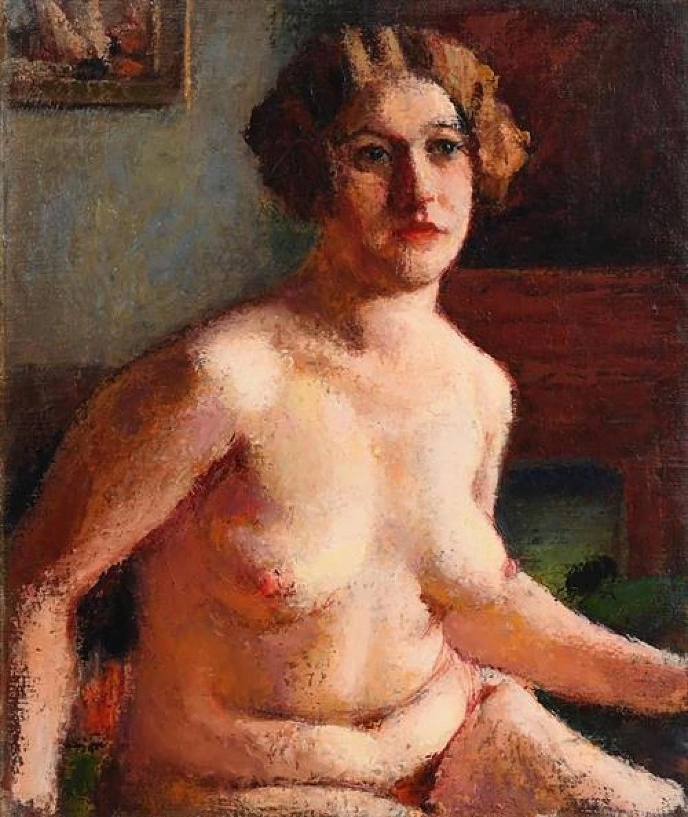 Nudo seduto